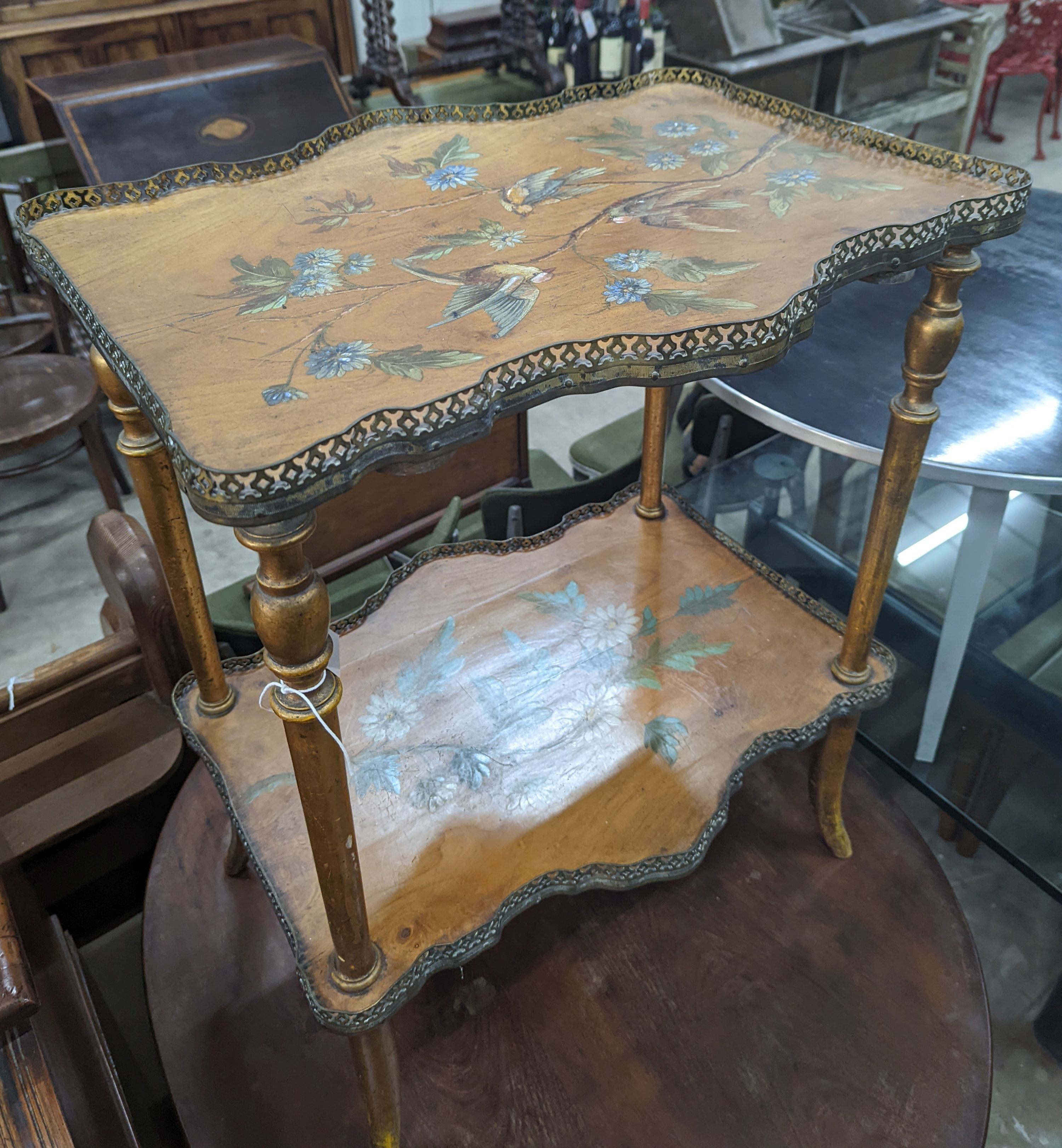 A late Victorian two tier walnut etagere, painted with birds amongst flowers, width 58cm, depth 43cm, height 74cm